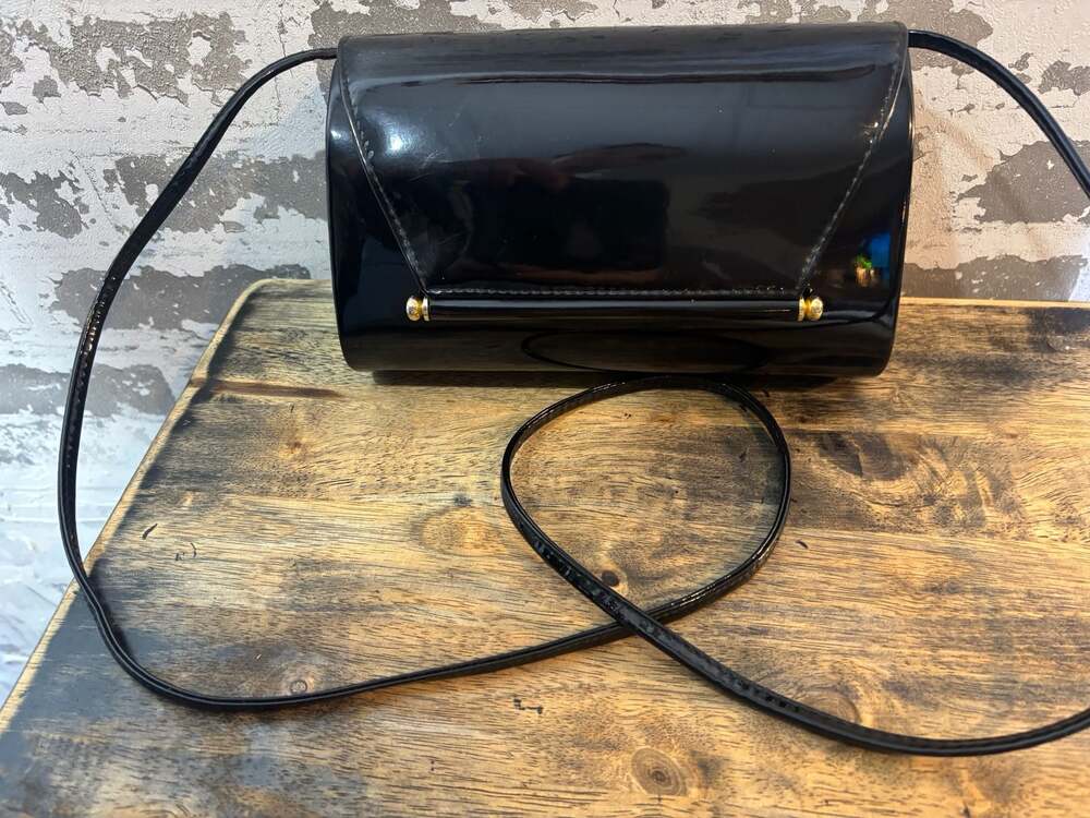 La Regale black patent leather evening bag